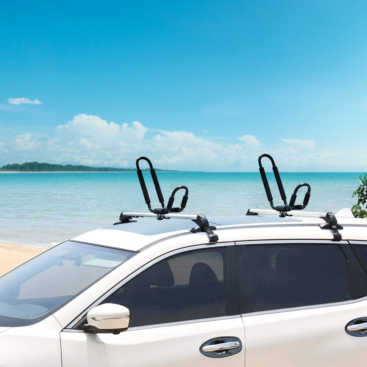 Universal steel J-bar kayak roof carrier pair for compatible vehicle crossbars — fit and installation view